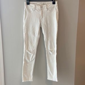 White Jeans With Small Rips